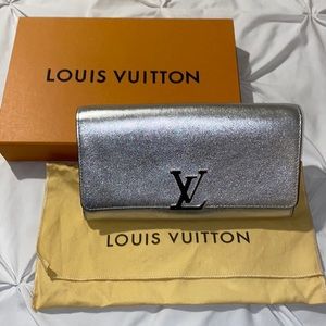 Authentic Louis Vuitton Silver clutch